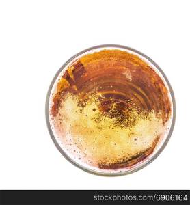 Fresh gold cold and delicious lager beer in glass over white background, shot from above