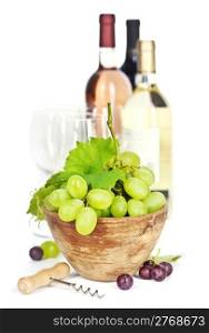 Fresh grape in bowl and wine isolated on white