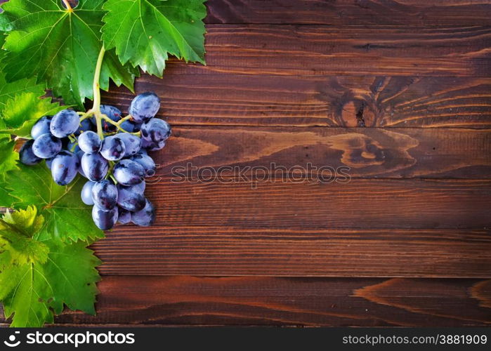 fresh grape on the wooden table, grape on a table