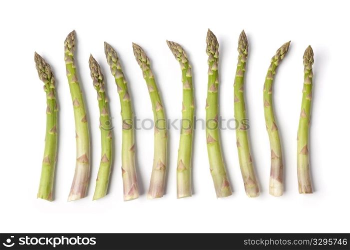 Fresh green Asparagus stalks on a row solated on white background