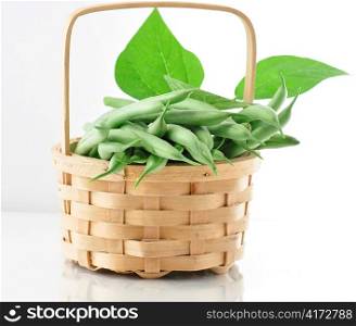 fresh green beans in a basket