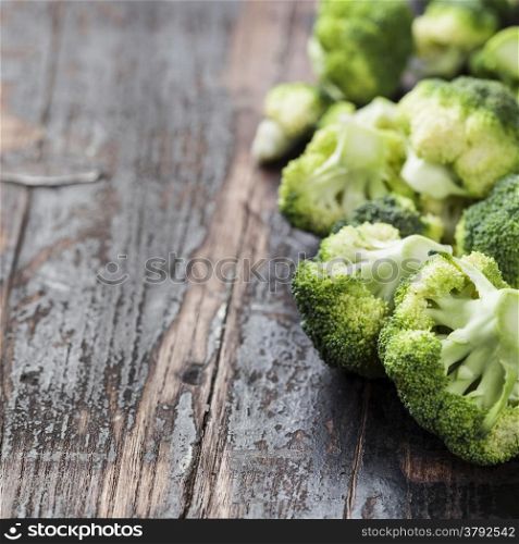 Fresh green broccoli on a Wooden Background.