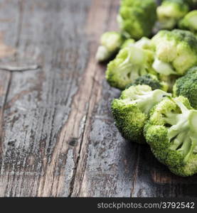 Fresh green broccoli on a Wooden Background.