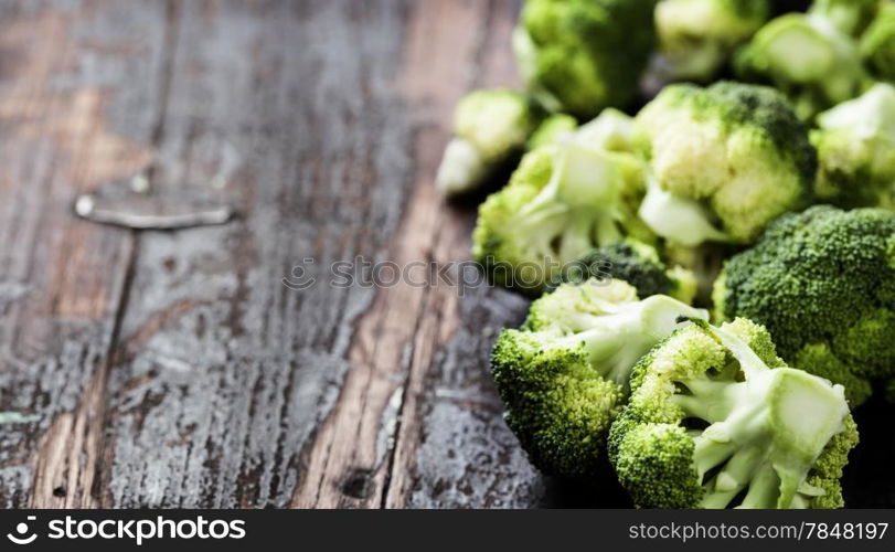 Fresh green broccoli on a Wooden Background.