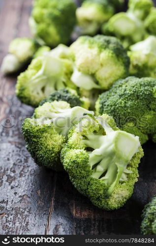 Fresh green broccoli on a Wooden Background.