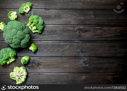 Fresh green broccoli. On a wooden background.. Fresh green broccoli.