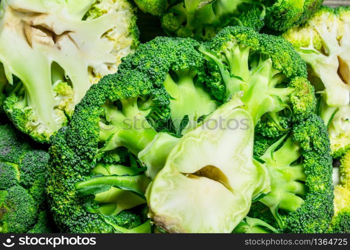 Fresh green broccoli. On a wooden background.. Fresh green broccoli.