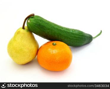 Fresh green cucumber with a tangerine and a pear lie on a white background