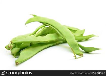 Fresh green hyacinth beans isolated on a white background.