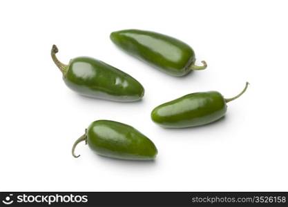 Fresh green Jalapeno chili peppers on white background