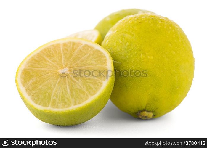 Fresh green limes isolated on white background.