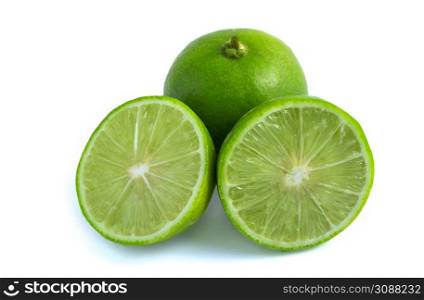Fresh green limes on white background