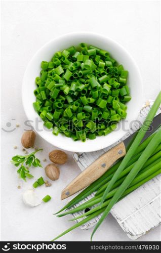 Fresh green onion sliced in bowl
