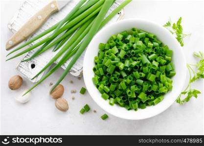 Fresh green onion sliced in bowl