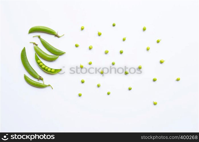 Fresh green pea pods and peas on white background