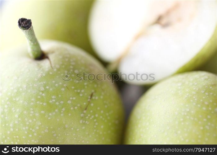fresh green pears, shallow depth of field