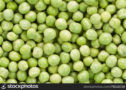 Fresh green peas as background. full of peas
