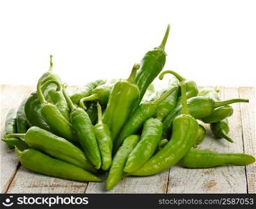 Fresh Green Pepper On A Wooden Table