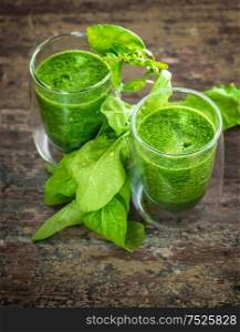 Fresh green spinach leaves smoothie. Healthy food concept. Selective focus