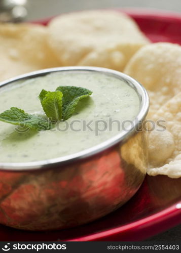 Fresh Green Yoghurt Chutney with mini Papadoms