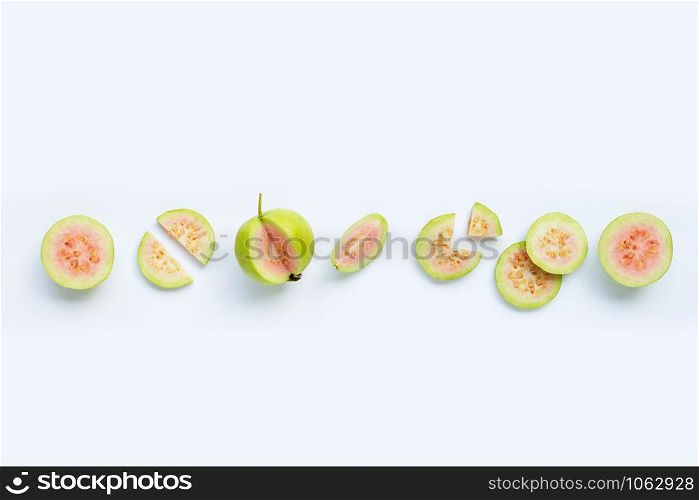 Fresh guava with leaves on white background. Copy space