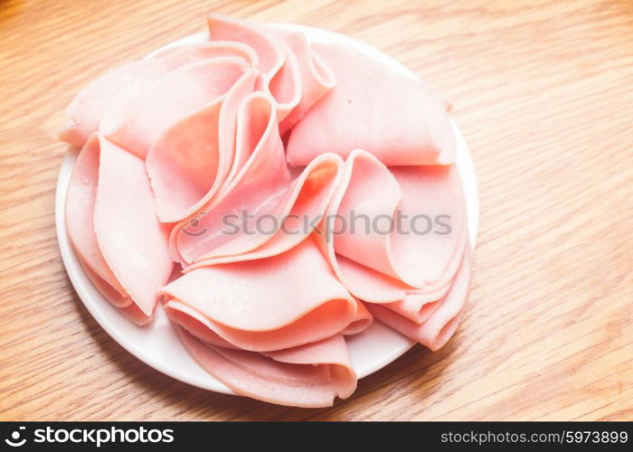 Fresh ham slices with on the plate. The Ham slices