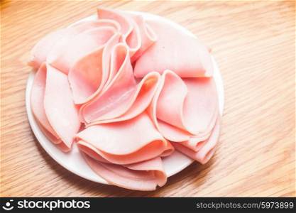 Fresh ham slices with on the plate. The Ham slices