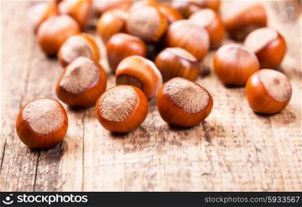 fresh hazelnuts on wooden table