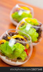 Fresh healthy salad in bowls