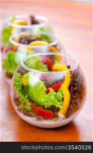 Fresh healthy salad in bowls