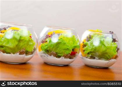 Fresh healthy salad in bowls