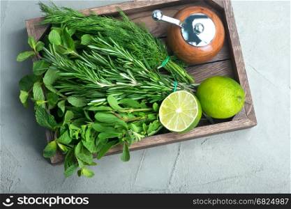 fresh herb in wooden box and on a table