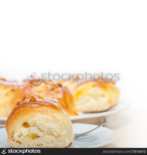 fresh home baked sweet bread donut cake with almonds and icing sugar on top