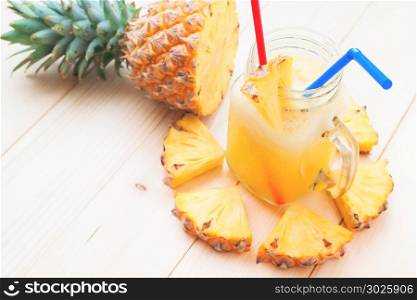 Fresh homemade pineapple smoothie with fresh pineapple