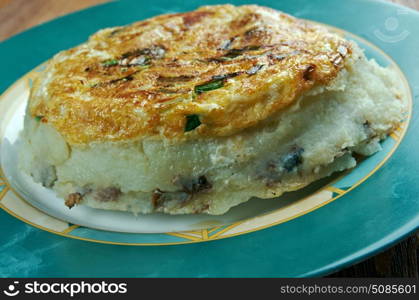 Fresh homemade Spanish tortilla with sardine