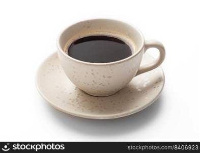 Fresh hot black creamy coffee in light porcelain cup on white.