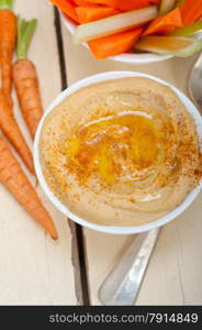 fresh hummus dip with raw carrot and celery arab middle eastent healthy food