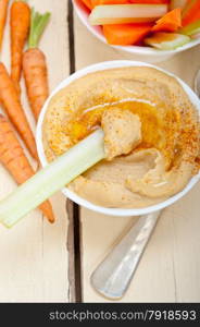 fresh hummus dip with raw carrot and celery arab middle eastent healthy food