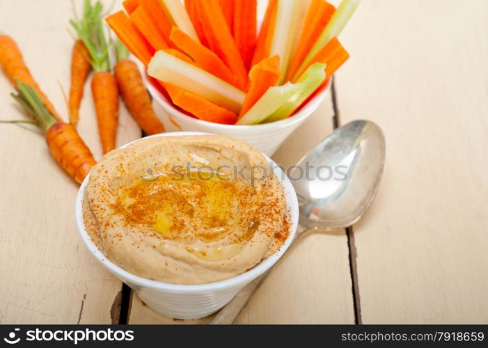 fresh hummus dip with raw carrot and celery arab middle eastent healthy food