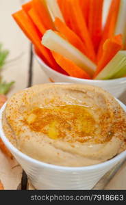 fresh hummus dip with raw carrot and celery arab middle eastent healthy food