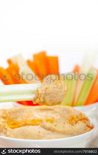 fresh hummus dip with raw carrot and celery arab middle eastent healthy food