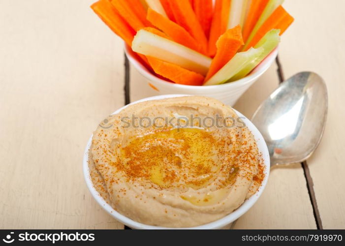 fresh hummus dip with raw carrot and celery arab middle eastent healthy food