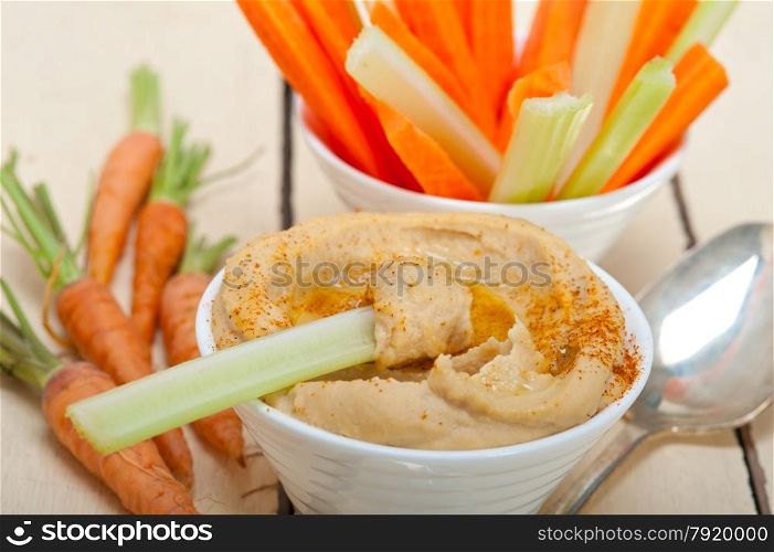 fresh hummus dip with raw carrot and celery arab middle eastent healthy food