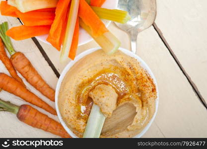 fresh hummus dip with raw carrot and celery arab middle eastent healthy food