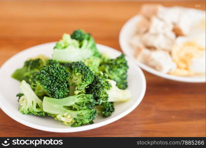 Fresh hydroponic vegetables on wooden table, stock photo