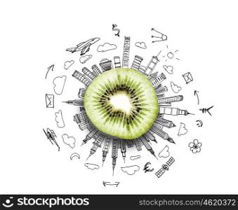 Fresh idea. Kiwi half against background with business sketches