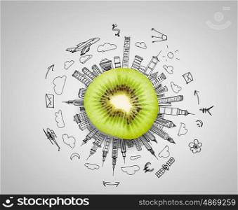 Fresh idea. Kiwi half against background with business sketches