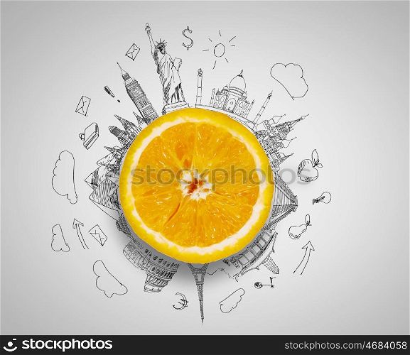 Fresh idea. Orange half against background with business sketches