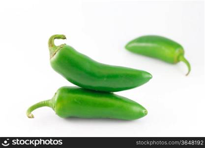 Fresh jalapeno peppers isolated on white background