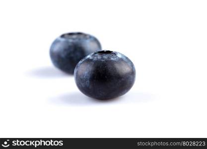 Fresh juicy blueberries isolated on white background